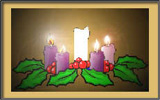 Advent wreath with four candles lit.