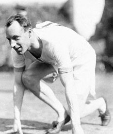 Eric Liddell set in the racing blocks getting ready to run.